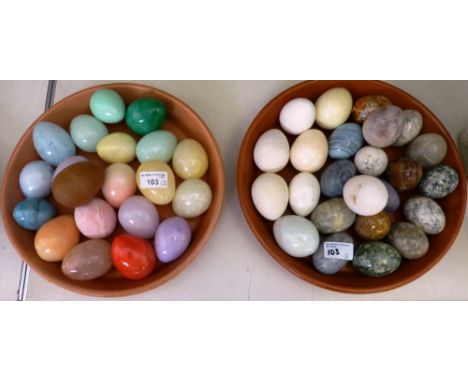 A collection of glass ceramic and stone eggs (3)