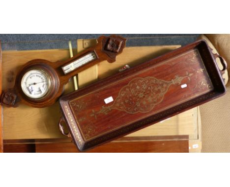An Indian brass inlaid hardwood oblong tray and an oak cased barometer with thermometer  (2)