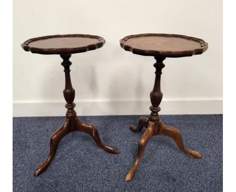 PAIR OF MAHOGANY WINE TABLESwith scalloped edge and turned tripod legs, 50cm high (2)