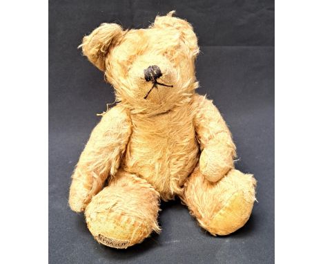 EARLY 20th CENTURY FARNELL ALPHA TOY TEDDY BEARwith label to foot 'A Farnell Alpha toy Made in England' in blue lettering, wi