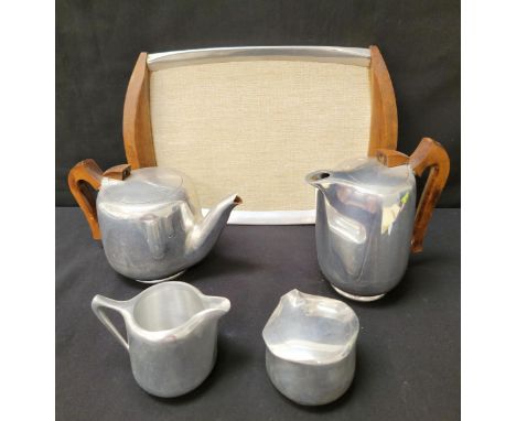 PICQUOT WARE TEA SETconsisting of tea pot, hot water jug, milk jug and sugar bowl on matching chromed tray (5)