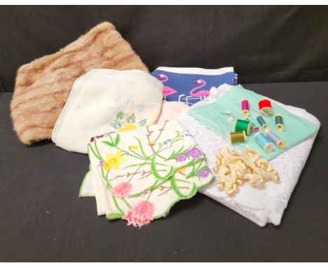 SELECTION OF VINTAGE TEXTILES AND BUTTONSincluding three silver buttons, embroidered cloths, retro prints and a fur stole fro