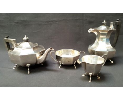 ART DECO STYLE FOUR PIECE SILVER TEA SET BY JOSEPH GLOSTERBirmingham 1962, the handles and finials of tea pot and hot water p