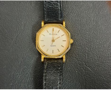 LADIES BULOVA WRISTWATCHthe dial with baton five minute markers and octagonal case, on leather strap