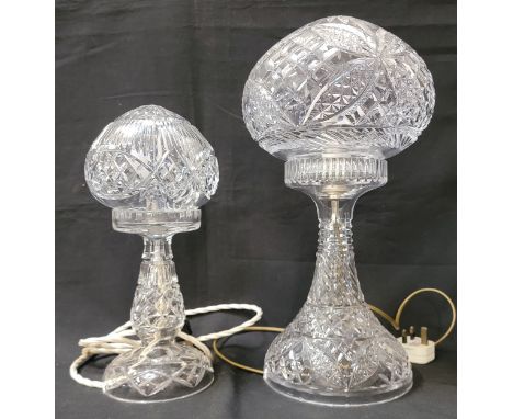 TWO CUT CRSYTAL GLASS MUSHROOM LAMPSof graduated size, the larger example 42cm high and the smaller example 31.5cm