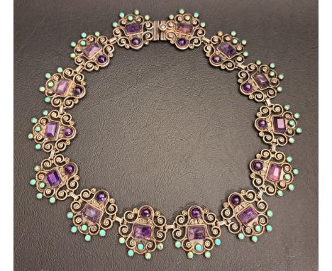 UNUSUAL AMETHYST AND TURQUOISE SET SILVER NECKLACEthe pierced links of scroll design, marked Dominguez, Mexico, 41cm long