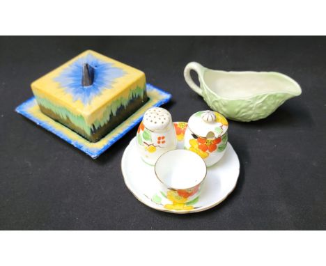 H J WOOD BURSLEM BUTTER DISHin Art Deco style, together with a Paragon cruet set, and a Carlton ware cabbage leaf sauce jug