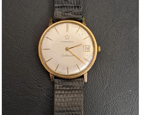 GENTLEMENS ETERNA-MATIC CENTENAIRE NINE CARAT GOLD CASED WRISTEWATCHthe champagne dial with baton five minute markers and dat