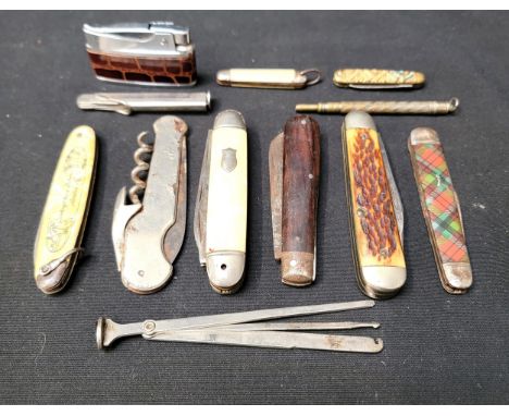 SELECTION OF VINTAGE SWISS ARMY KNIVES AND OTHER TOOLSincluding a Duncan pip cleaner, a tartan wear Swiss army knife, another