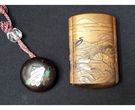 A JAPANESE FOUR-CASE INROthe gold lacquered ground decorated with storks and herons in landscape with water wheel, grass and 
