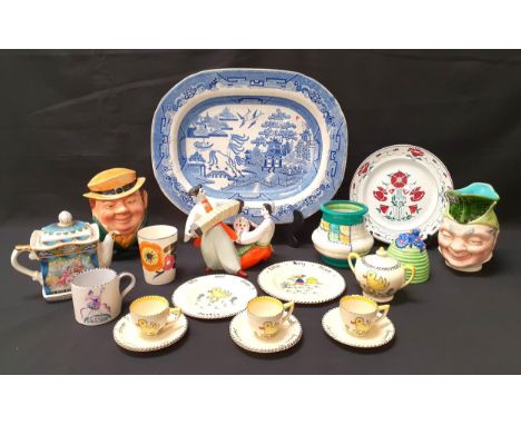 SELECTION OF DECORATIVE CERAMICScomprising a Sarreguemine character jug; a Bizzare by Clarice Cliff 'Marguerite' honey pot an