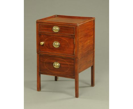 A Georgian mahogany bedside cabinet, with drawer above a cupboard with commode beneath, raised on moulded legs.  Height 81 cm