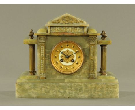A late 19th century onyx cased mantle clock, with two train striking movement.  Height 29 cm, width 35.5 cm, depth 14 cm.