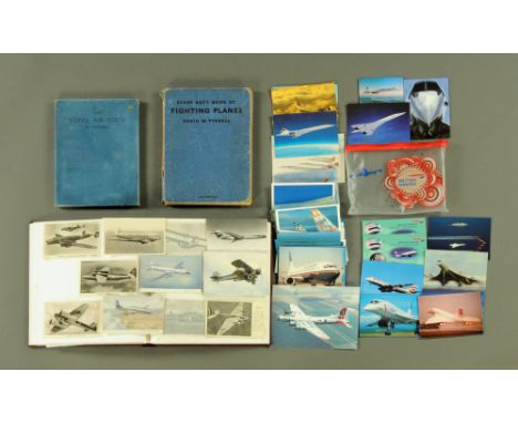 An album containing a quantity of vintage aircraft postcards etc, together with an RAF picture book and Every Boys book of Fi