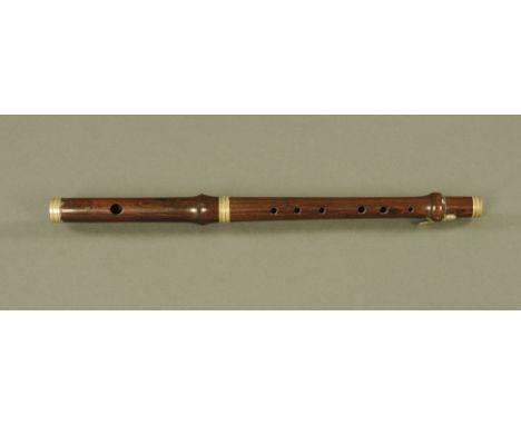 A vintage rosewood piccolo.  Length 37 cm.
