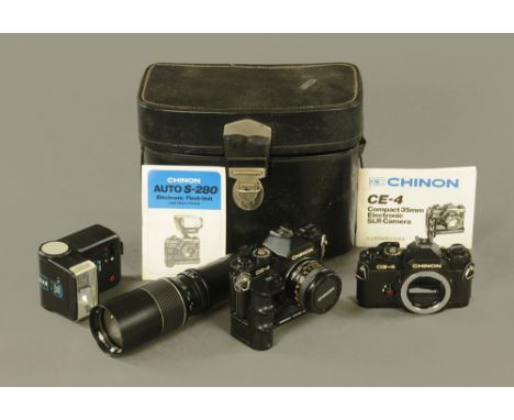 A vintage Chinon CE4 camera x 2, with various lenses, flash unit and case.