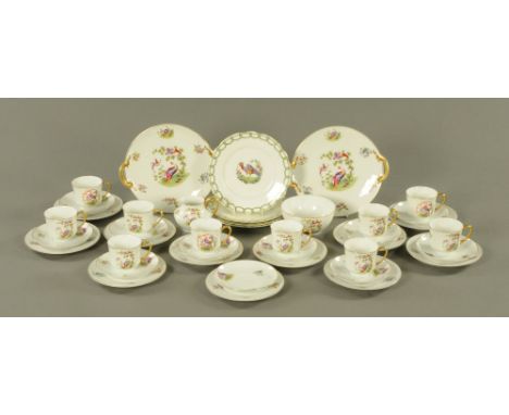 A continental porcelain tea service, 2 plates, sugar basin, cream jug, 10 cups, 11 saucers, 11 plates and 4 similar Royal Dou