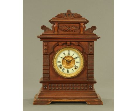 A 19th century American mantle clock, with two train striking movement by the Ansonia Clock company.  Height 44 cm, width 32 