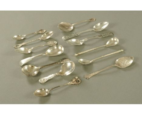 A collection of thirteen spoons, including two Russian Niello spoons one marked 84 Zolotnik, maker Aleksander Cordes St Peter