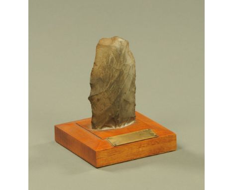 "A Rejected Neolithic Axe", from Scawfell Pike, presented to JC Wade OBE JP Lord Lieutenant of Cumberland 1969.  With note gi