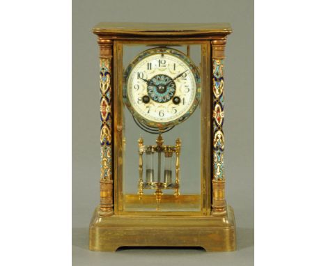 A late 19th century French champleve enamel library clock, with two train L.P. Japy & Co movement.  Height 17 cm, width 17 cm