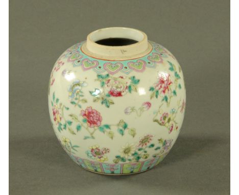 A 19th century Chinese polychrome ginger jar, with concentric ring mark to base.  Height 12 cm. CONDITION REPORT: There are n