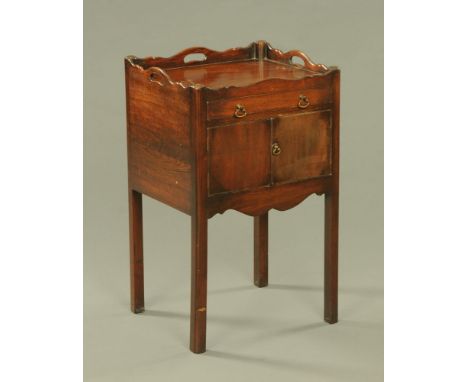 A George III style mahogany tray top type bedside cabinet with drawer and cupboards.  Height 79 cm, width 49 cm, depth 42 cm.