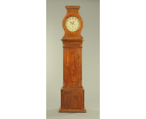 A 19th century continental oak and possibly walnut longcase clock, with two train striking movement, the case with blind fret