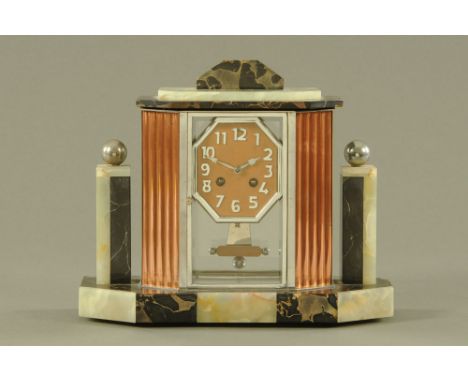 A French Art Deco marble and onyx cased mantle clock, with Arabic numerals to the dial and two train spring driven movement. 