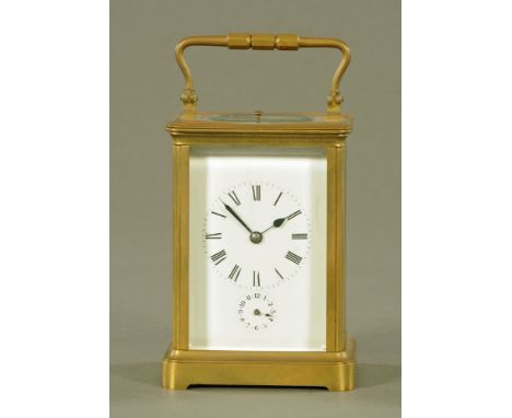 A late 19th century French brass carriage clock, with repeat mechanism and alarm.  Height excluding handle 13 cm.