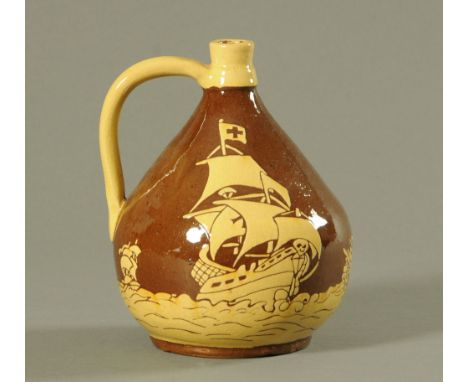 A 19th century slip ware jug, decorated with sailing vessels.  Height 23 cm. CONDITION REPORT: There is crazing and some smal