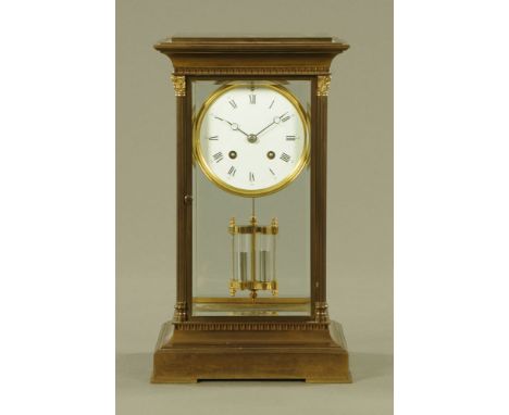 A brass cased four glass mantle clock, with two train striking movement and mercury weighted pendulum.  Height 33 cm, width 1