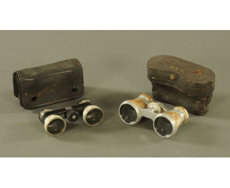 A pair of vintage Busch mother of pearl mounted opera glasses, and another slightly larger similar pair.