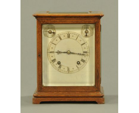 A 19th century oak cased four glass clock, with movement by Winterhalder &amp; Hofmeier, with two train movement striking on 