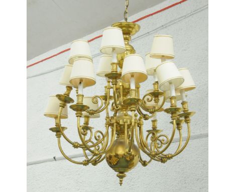 A large heavy brass chandelier type centre light fitting, fifteen branch.  Height excluding hanging chain 100 cm, width +/- 9