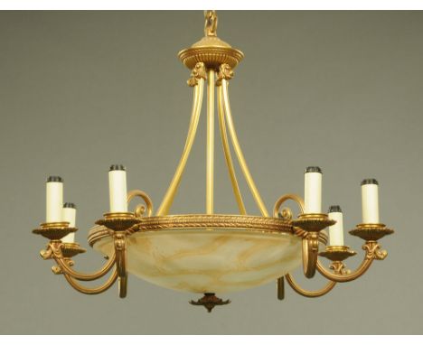 A Regency style four twin branch chandelier type light fitting in brass.  Width +/- 82 cm, height excluding suspension +/- 60