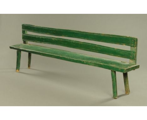 A 19th century painted pine bench.  Height to top of back 78 cm, length 247 cm, depth 31 cm. CONDITION REPORT: The bench is s