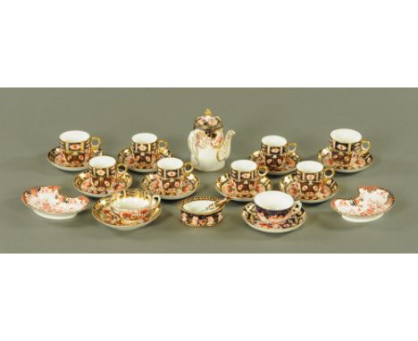 A Royal Crown Derby coffee service, comprising coffee pot, six cups, six saucers and together with a butter dish with knife, 