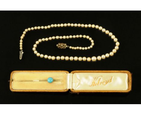 A cultured pearl necklace with sterling silver clasp, together with a turquoise set stick pin.