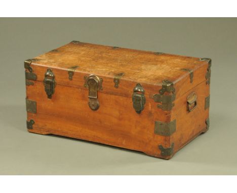A small 19th century brass bound camphorwood trunk, with carrying handle to either side.  Height 33 cm, width 74 cm, depth 43