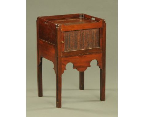 A Georgian mahogany tray top commode, with tambour front door raised on moulded legs.  Height 76 cm, width 48 cm, depth 43 cm