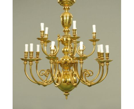A large heavy brass chandelier type centre light fitting, fifteen branch.  Height excluding hanging chain 100 cm, width +/- 9