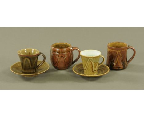 Edward Hughes (1953-2005), two studio pottery coffee cups and saucers and two mugs, all with impressed marks.  Tallest 10 cm.