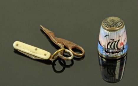 A Scandinavian silver and enamelled thimble, together with a miniature pair of scissors and penknife.
