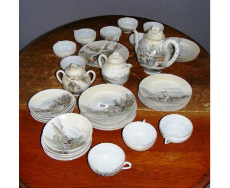 A mid 20th century oriental Japanese egg shell porcelain tea service, painted with landscape scenes.