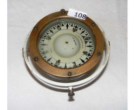 A Sestrel 1941 ship compass, the dial disgned by C. Butterfield & Co London.