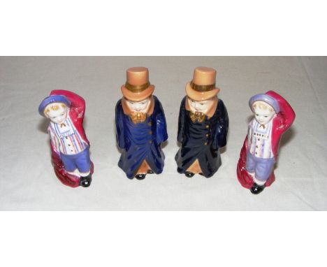 Four Royal Worcester candle snuffers.