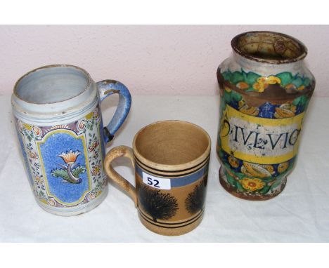 An antique group lot consisting of a 16th century Venetian Albarello pharmacy jar, a 19th century Mocha ware tankard, and ant