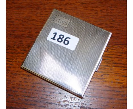 A sterling silver cigarette case, engine turned,  hallmarked for Birmingham.