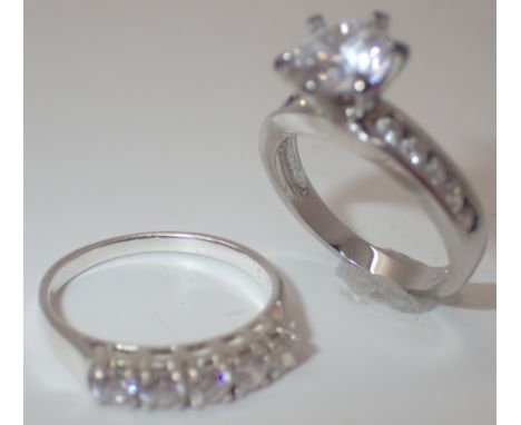 925 silver solitaire ring and a 925 silver half eternity ring sizes J and K 